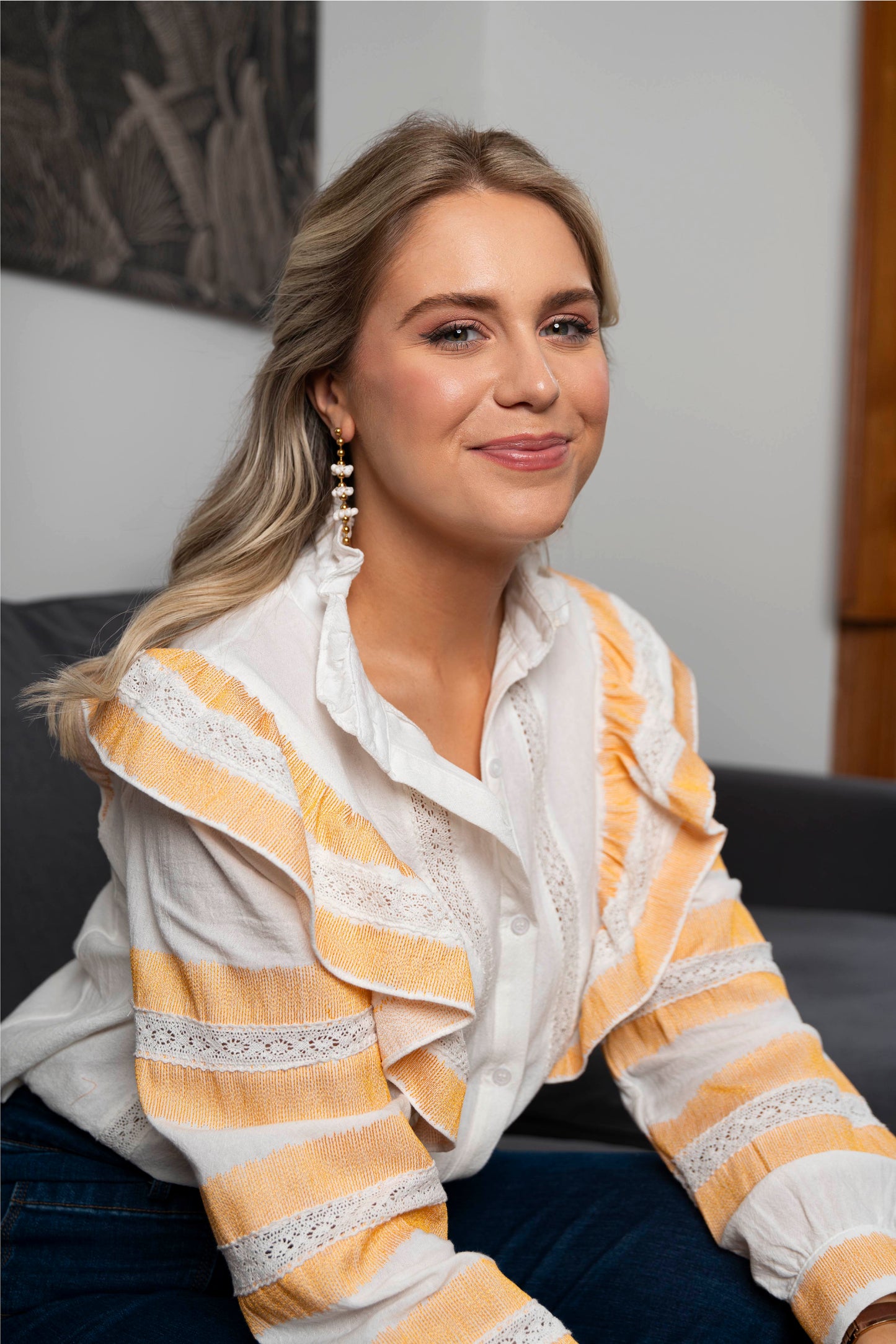 White and orange ruffled shirt